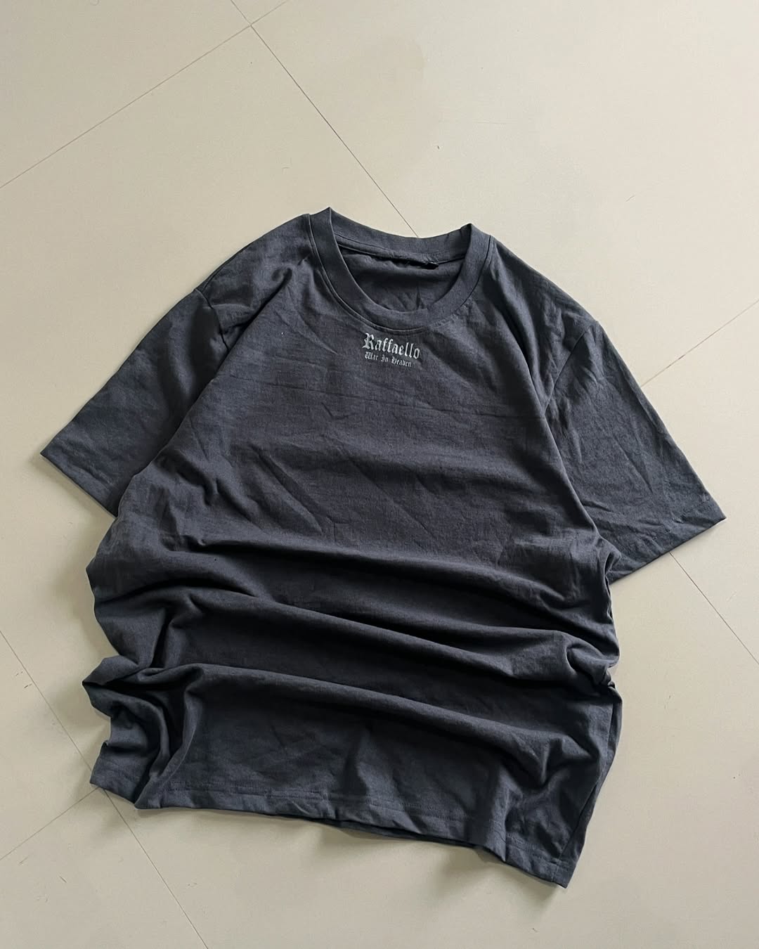 Front view of Charcoal black t-shirt with detailed Renaissance painting and silver ornate frame print on back – Junk Fits