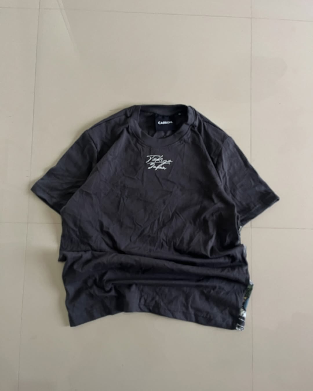 Front view of Black oversized t-shirt with large skeleton and traditional Japanese battle scene print – Junk Fits ukiyo-e inspired streetwear