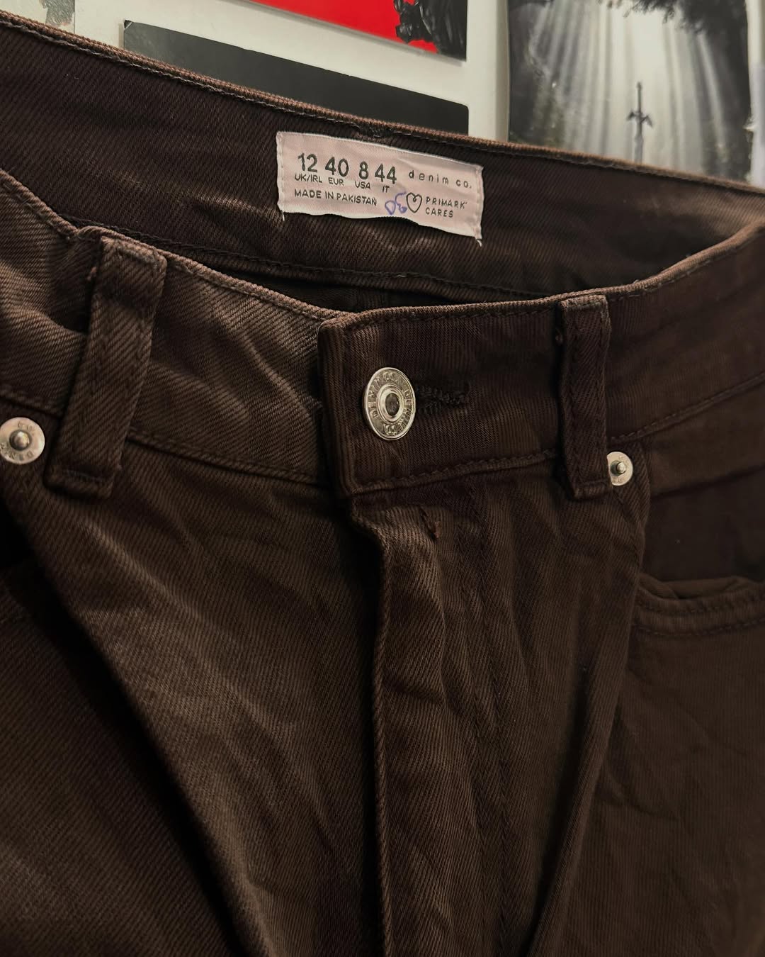 Close-up of fabric and front detailing on Junk Fits Baggy Jeans
