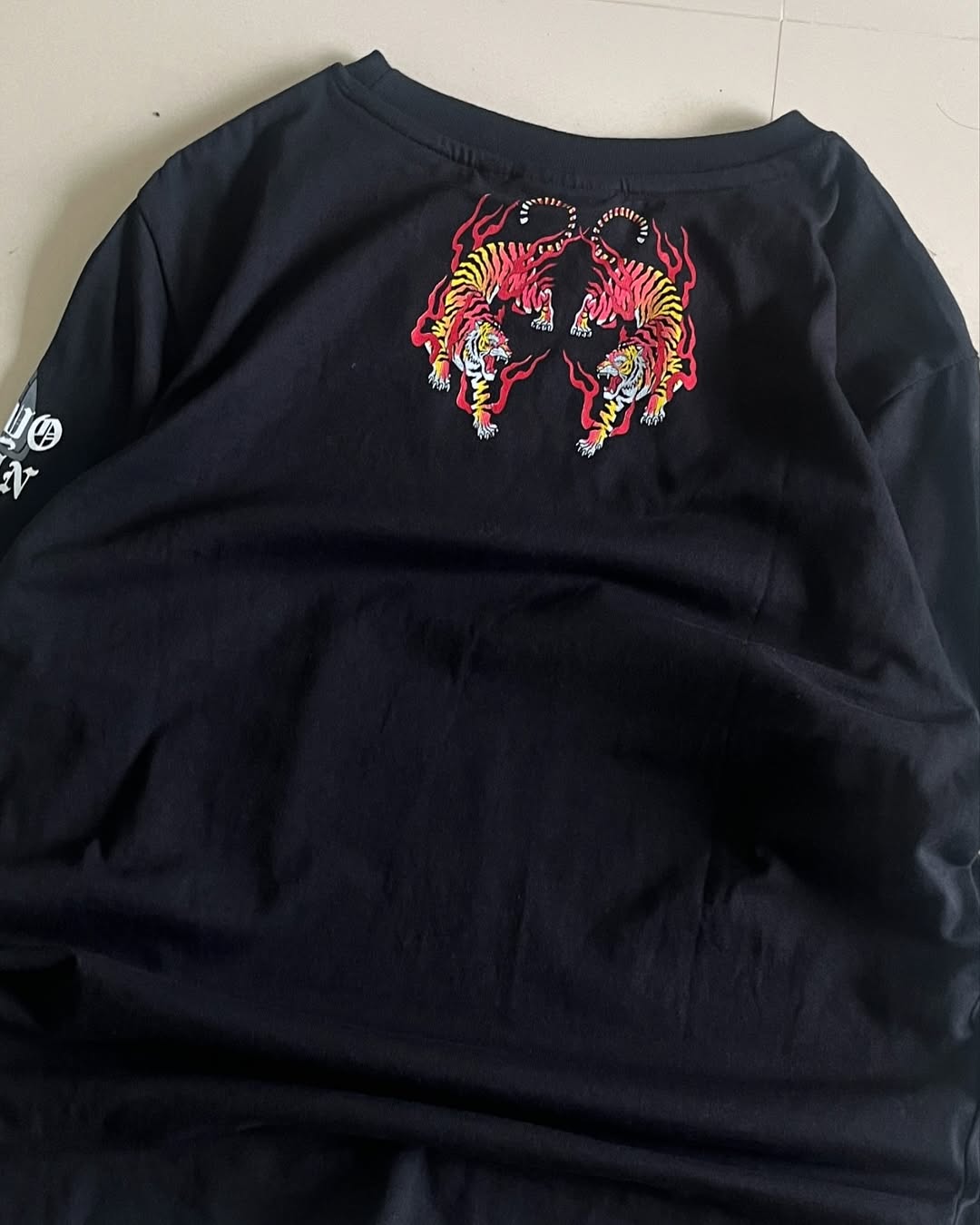 Black oversized Tokyo Japan tee with twin tiger graphic and flame design by Junk Fits