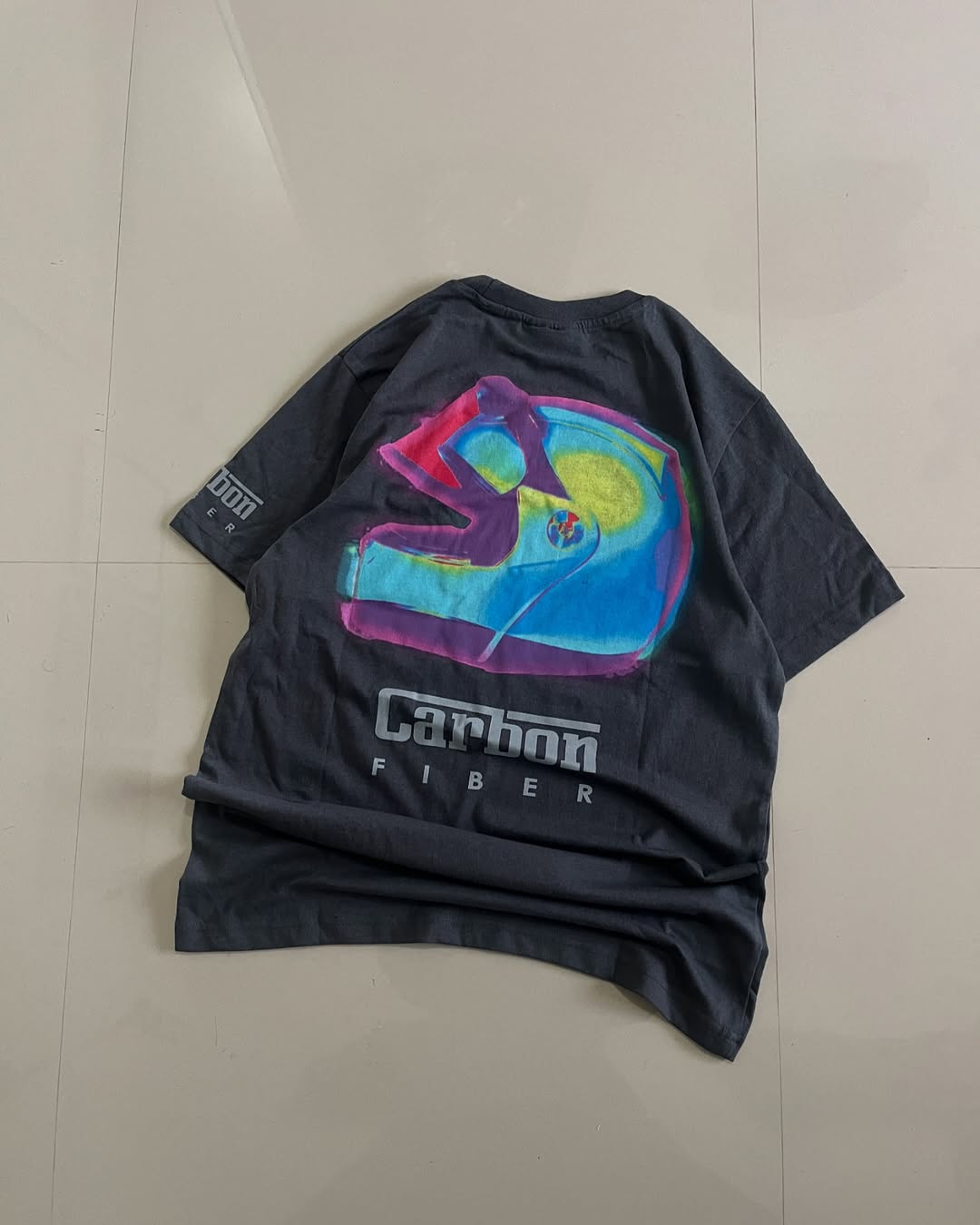 Black oversized t-shirt with colorful thermal helmet graphic and Carbon Fiber branding