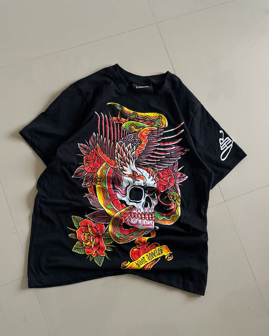 Front view of Junk Fits Saint Angeles Tattoo Skull Graphic Tee with snake, skull, and roses design