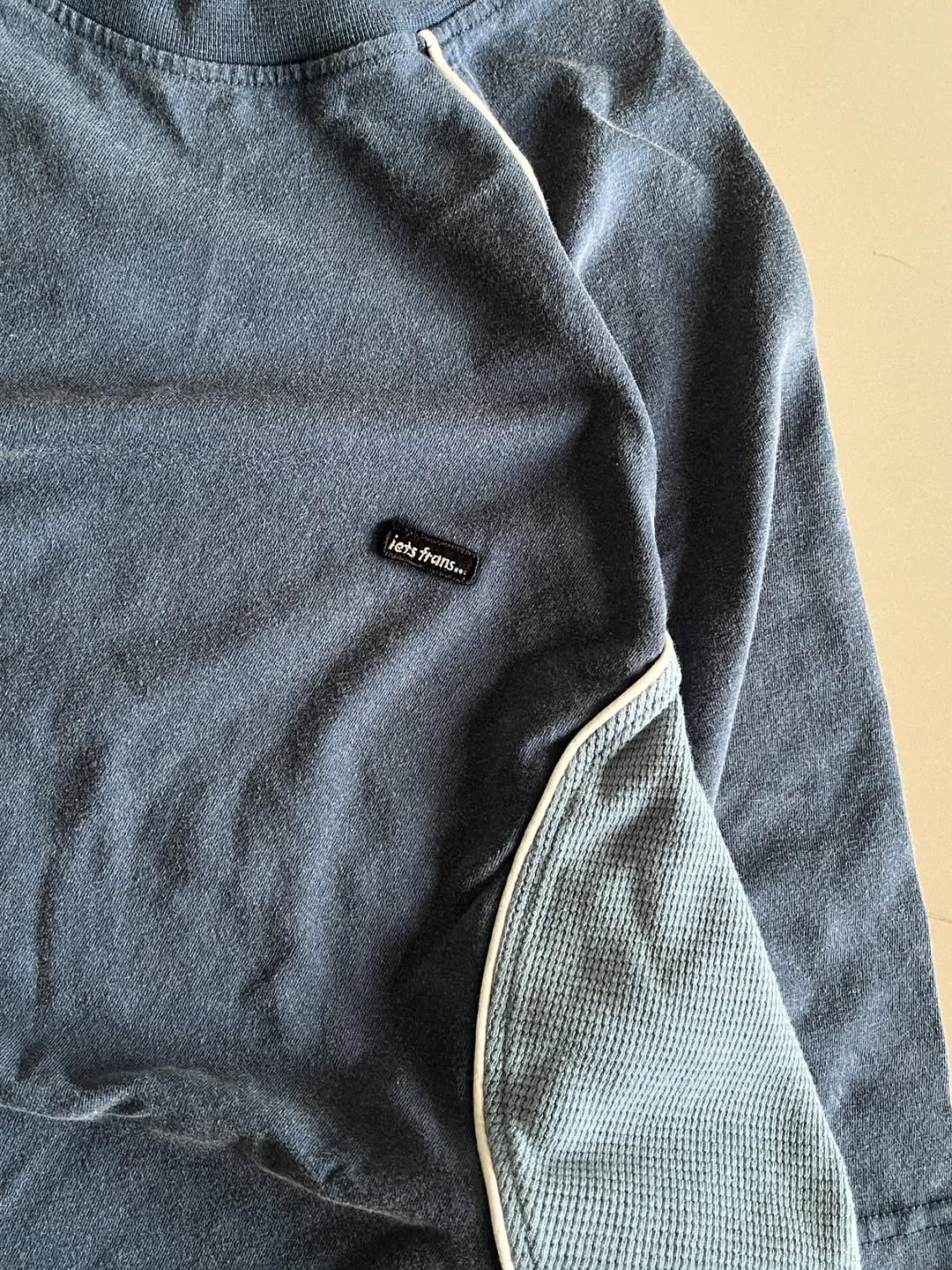 JUNKFITS blue panel tee closeup look