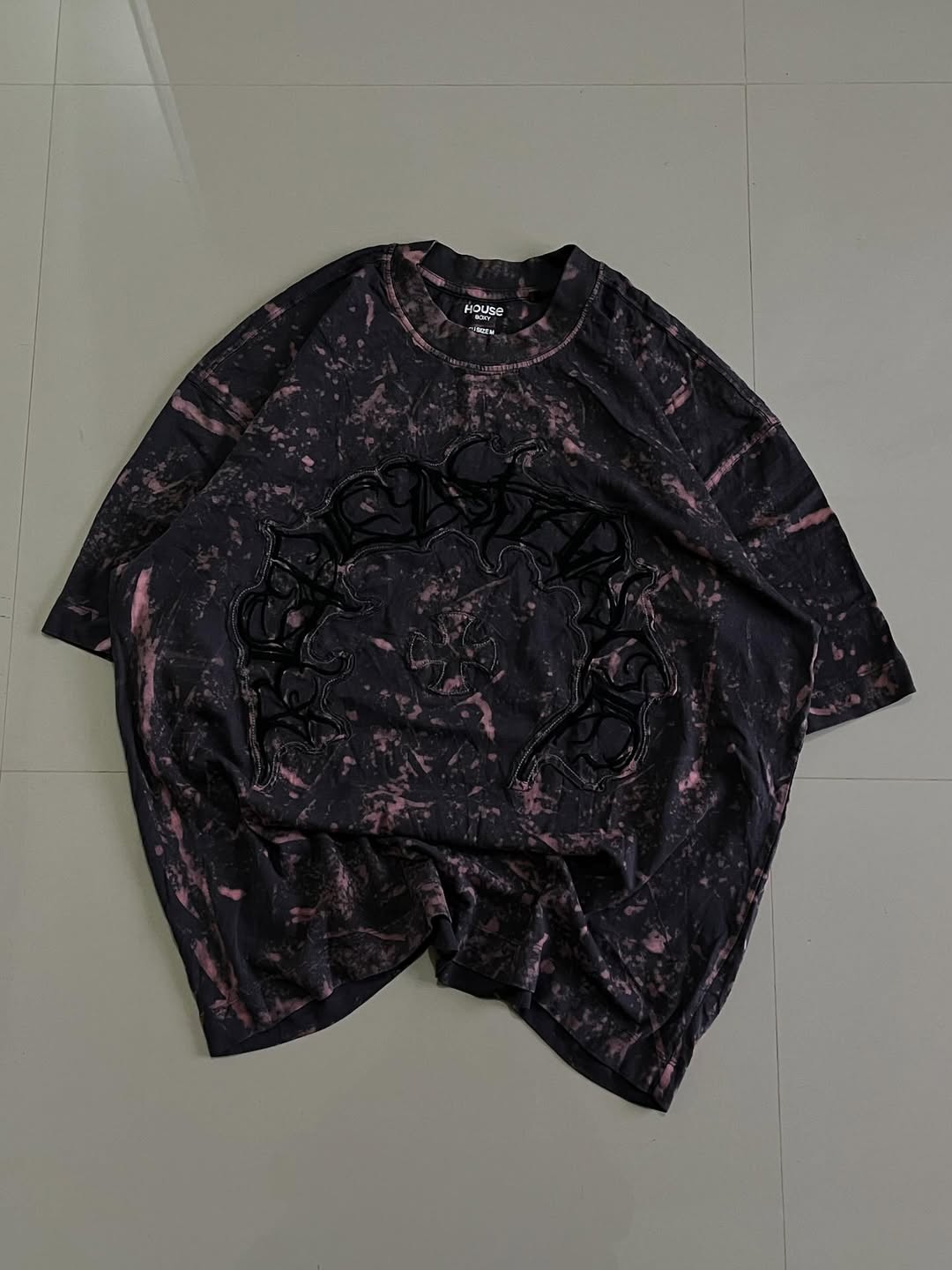 Horse oversized bleach-style t-shirt with black gothic "Rockstar" text and grunge pattern

