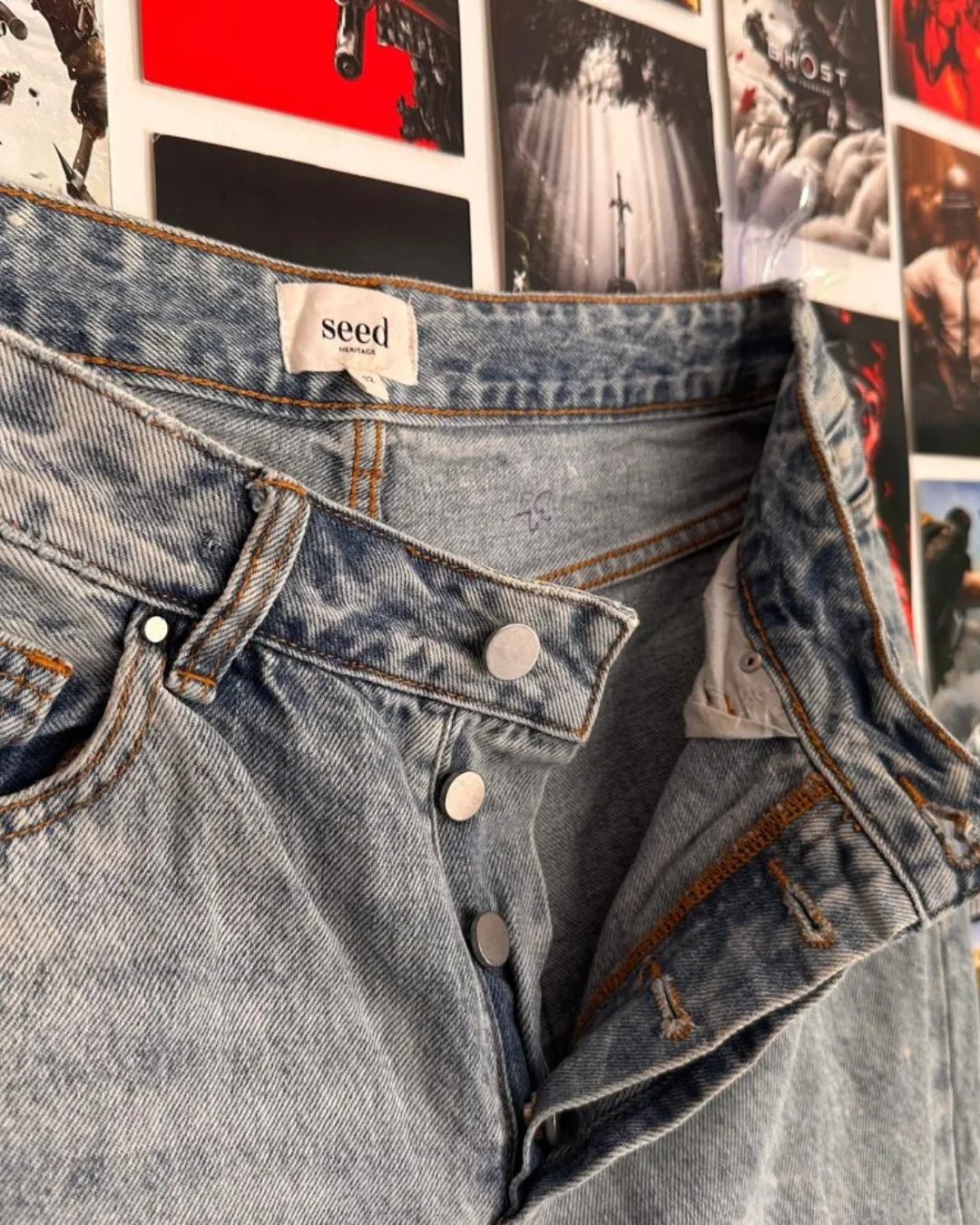 Close-up of fabric and front pocket details on Junk Fits Branded Baggy Jeans