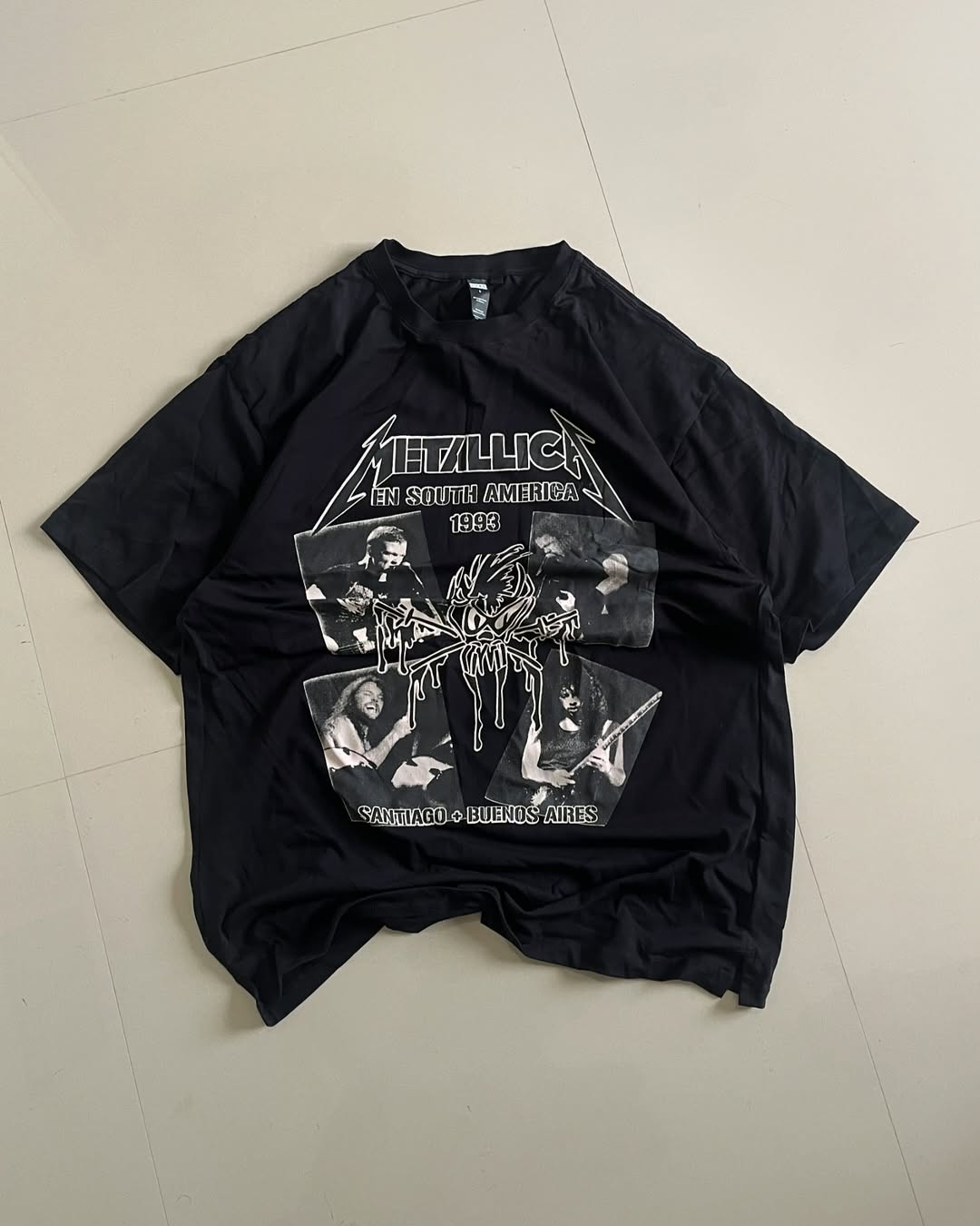 Black Metallica South America 1993 graphic tee laid out flat

