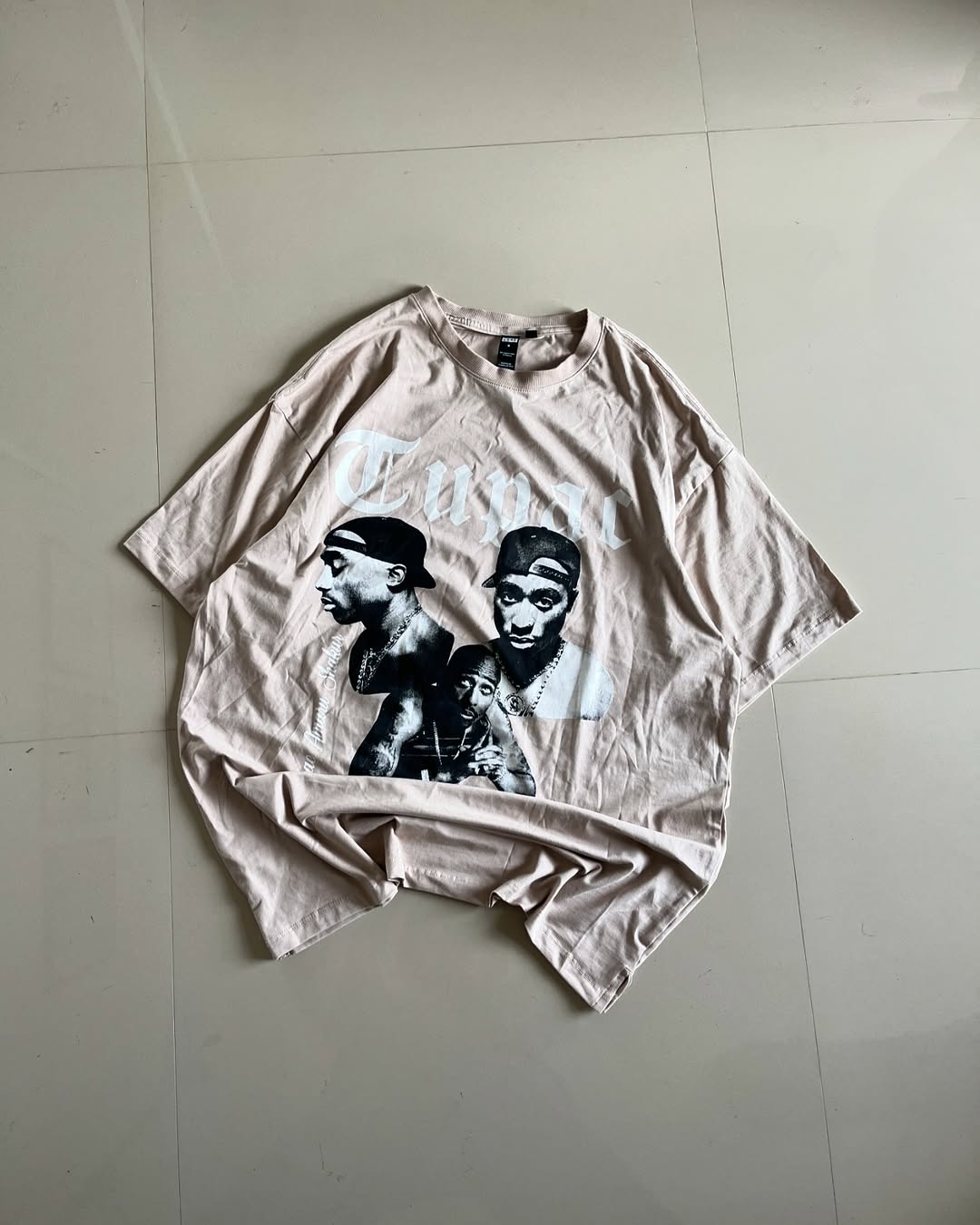 Beige Tupac oversized tee with vintage rapper prints

